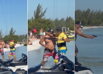 Veja minuto a minuto do vídeo que mostra banhista sacando arma e apontando contra velejador em Arraial do Cabo