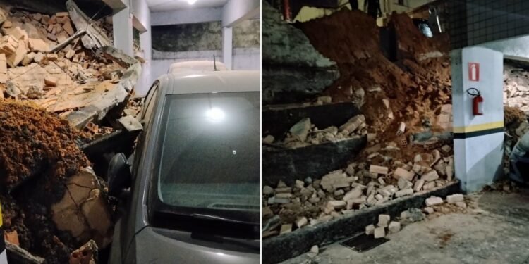 Parte de muro de condomínio, em BH, cai e atinge dois carros em estacionamento